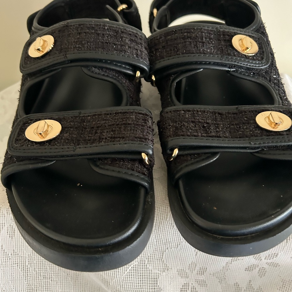 H&M black sparkled sandal with Velcro closures open toed faux buckles. Size 8